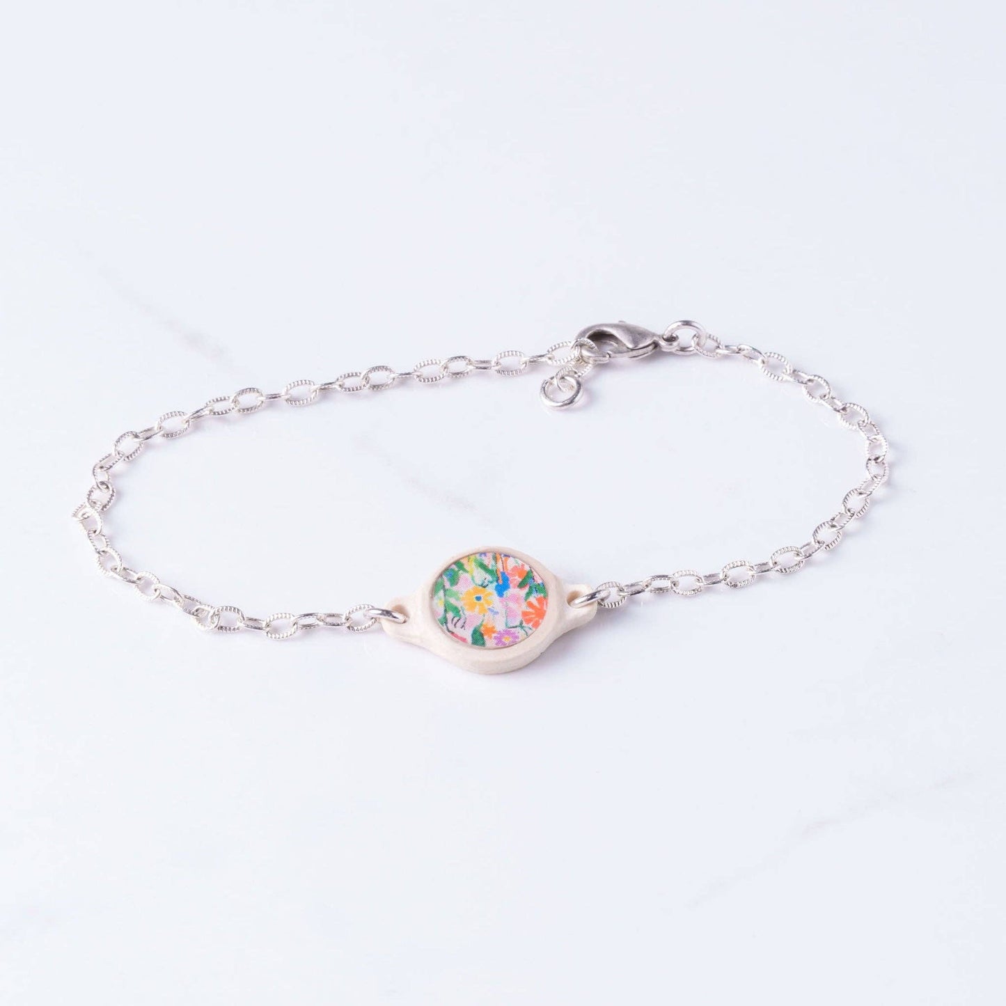 Tap To Pray® Survivor Series Bracelet: Silver-Plated + Wild Flowers