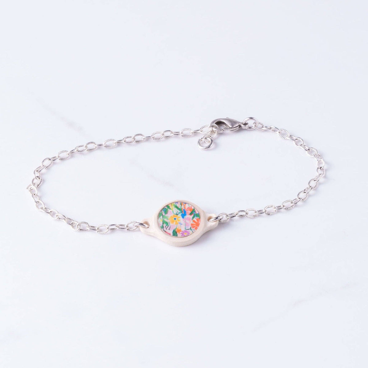 Tap To Pray® Survivor Series Bracelet: Silver-Plated + Wild Flowers