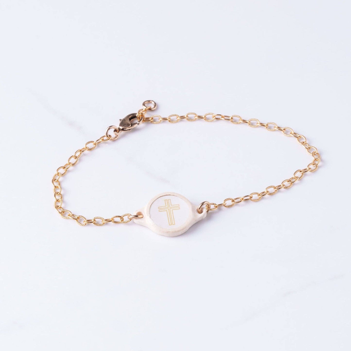 Tap To Pray® Survivor Series Bracelet: Gold-Plated + Vanilla Cross